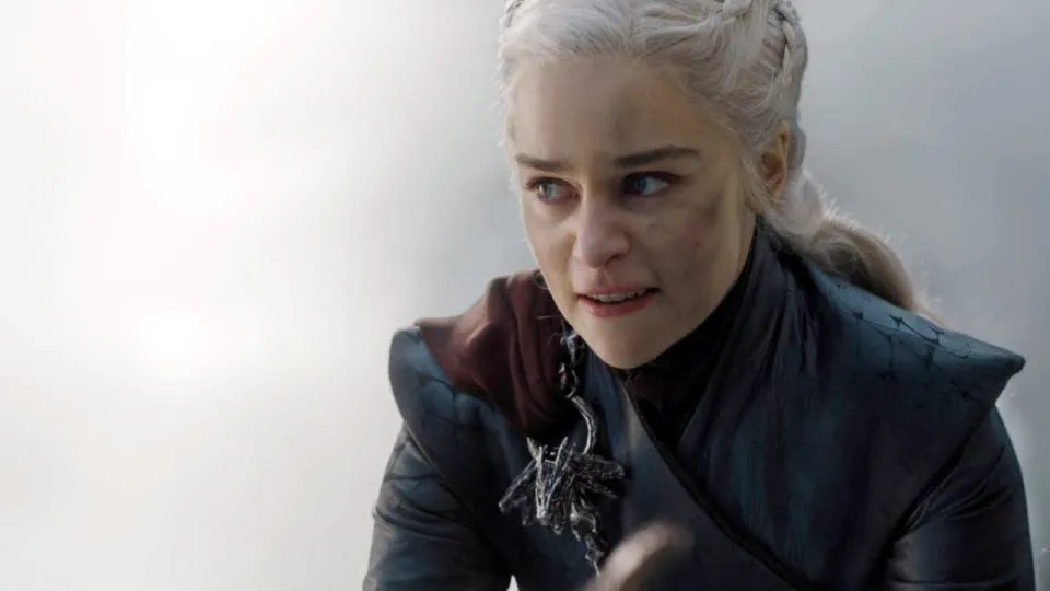 Daenerys Targaryen in Game of Thrones, looking determined and commanding — used to illustrate the article's theme that women rulers have historically been more likely than kings to wage war.